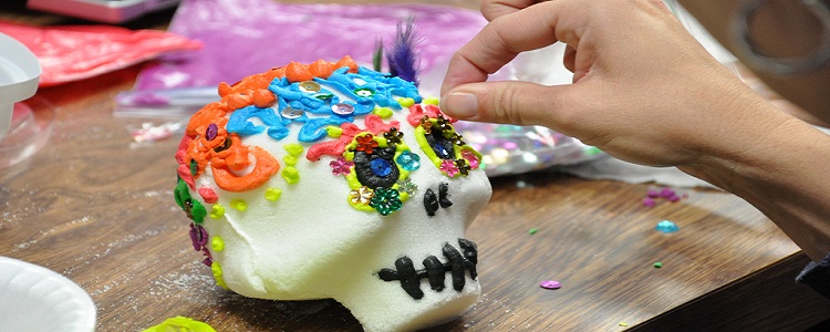 Sugar Skulls are made with sugar pressed into molds then decorated once the sugar has hardened